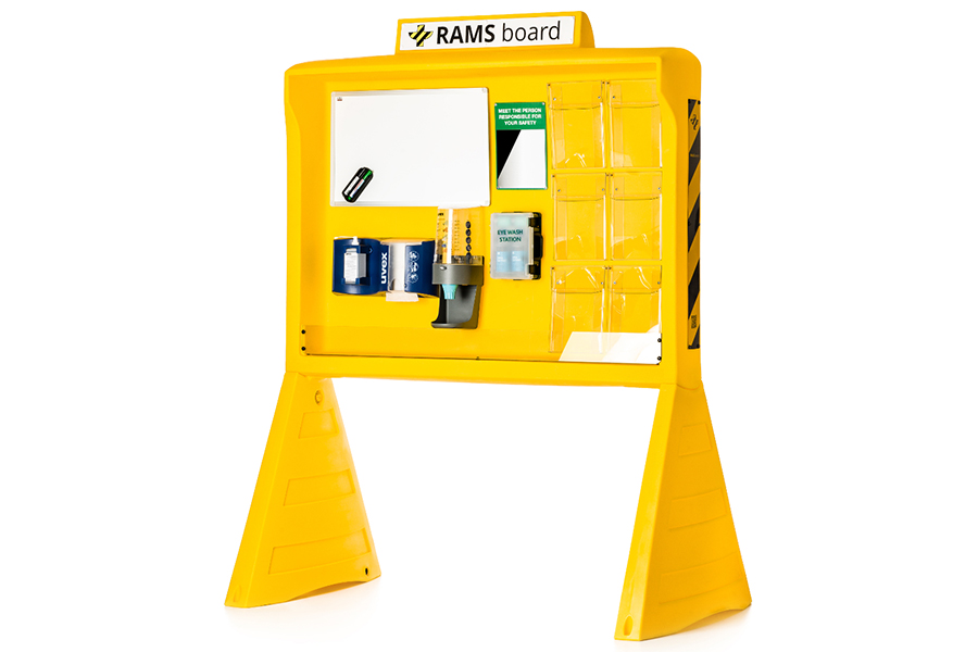RAMS board standing at a construction site entrance with safety documents on display