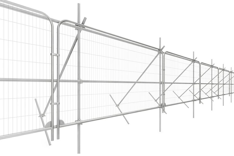Scaffold tube tree protection fencing with mesh panels braced around a retained tree on a building site