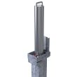 Close-up of retractable stainless steel parking bollard with secure integral lock for driveway protection and vehicle access restriction.