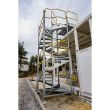 Construction workers using a Temporary Spiral Staircase for multi-level access