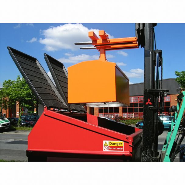 Forklift using skip compactor attachment to compress waste inside skip bin, improving site safety and reducing disposal frequency.